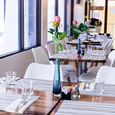 Restaurant dining area, tables ready for guests.