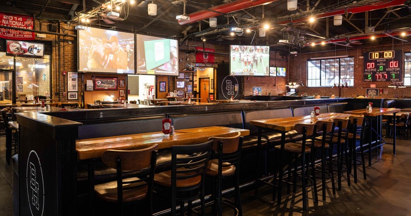 Interior, long banquette seating, chairs, decoration
