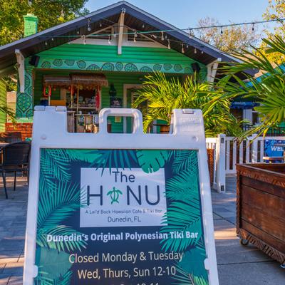 Exterior space, restaurant signage stand.