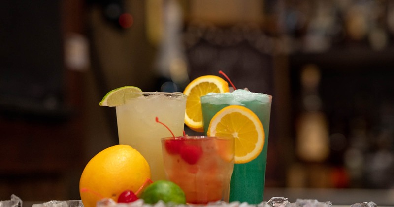 Interior, wide view, dining tables and seating, bar area