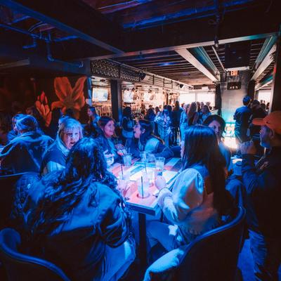 Patrons sitting at the table.