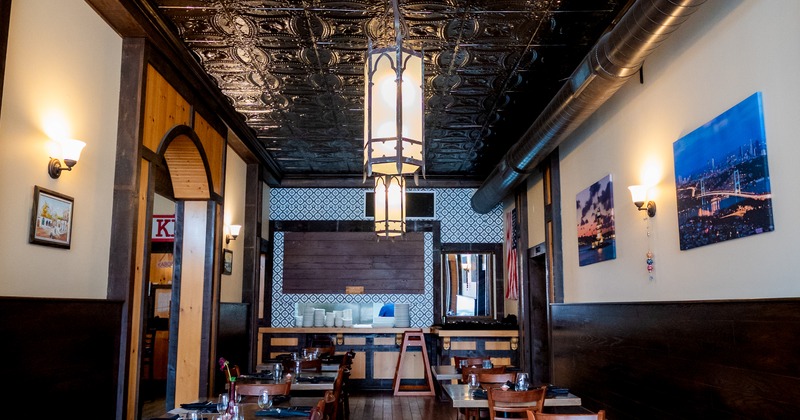 Interior, dining space with art on the walls