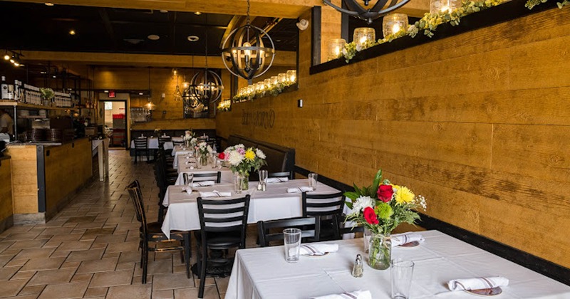 Interior, tables and chairs all lined up ready for guests