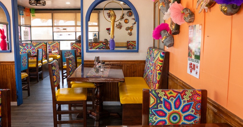 Interior, diner tables, chairs, decorated wals