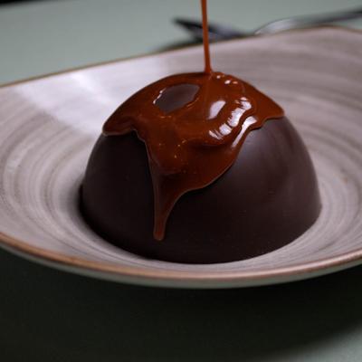 Chocolate dome, vanilla gelato, organic strawberries, salted caramel.