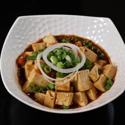 Stir fried tofu in homemade chili paste sauce.