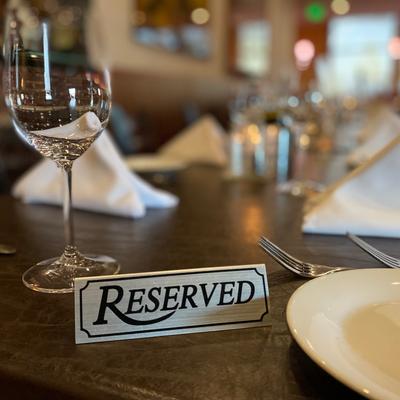 Table with reserved sign.