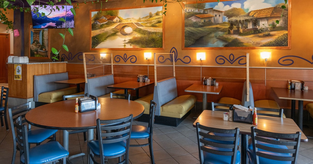 Interior, tables and chairs ready for guests