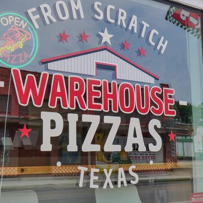 Restaurant window sign, close-up.