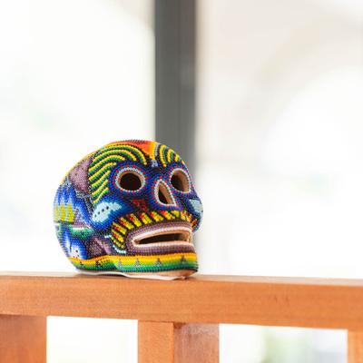 Skull lined with beads.