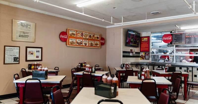Interior, tables and chairs in dining area