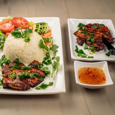 Marinated grilled steaks, with rice and salad.