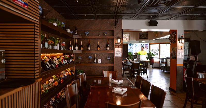 Tables by the wine rack