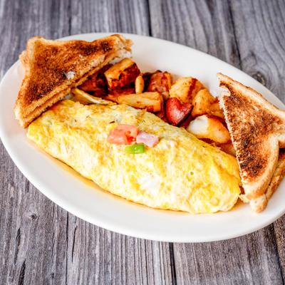 Betty's Omelette served with two slices of toast and home fries.