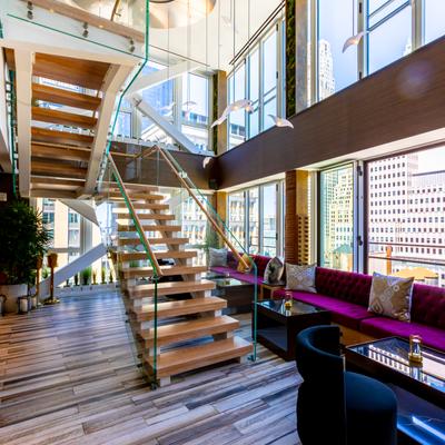 Seating area, stairs leading up.