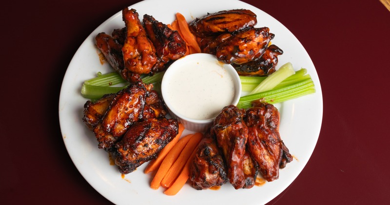Smokehouse Wings served with celery, carrots, and ranch