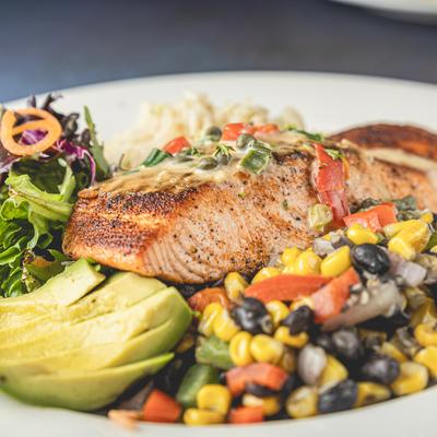 Grilled salmon, with salsa, and vegetables.