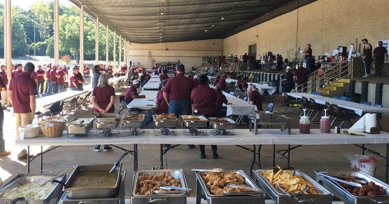 Crowd at an outdoor buffet event