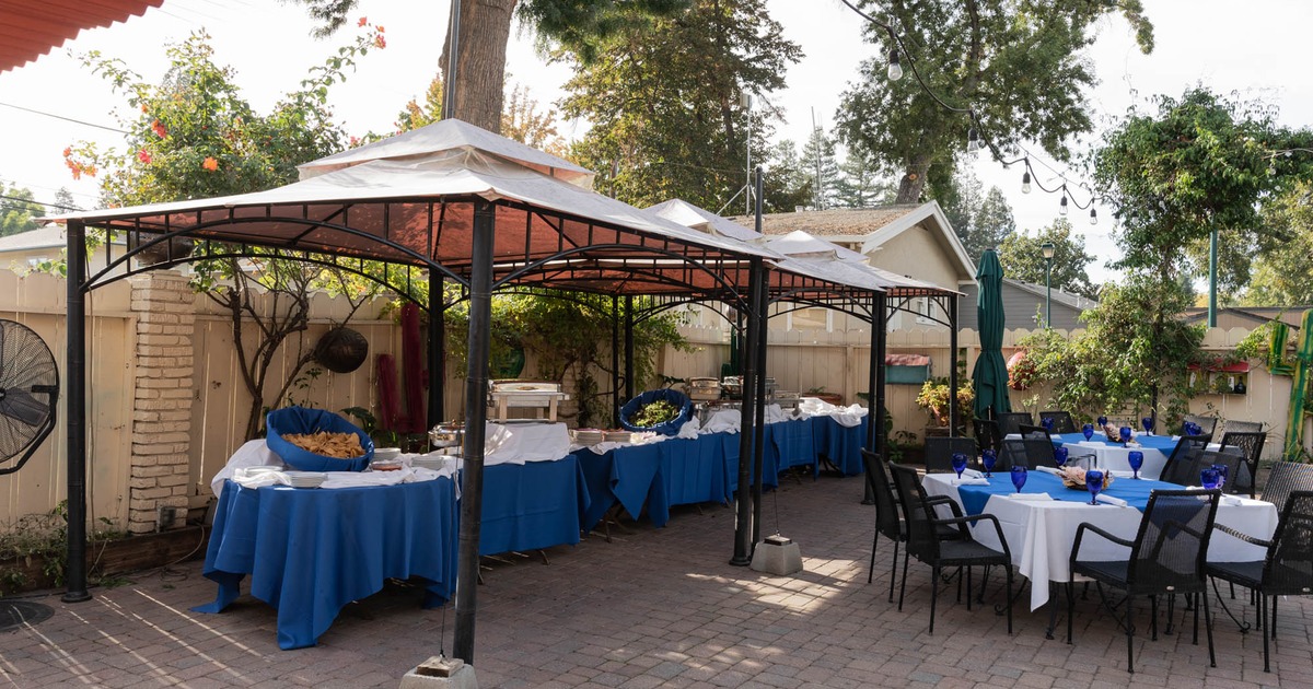 Backyard seating area and buffet table
