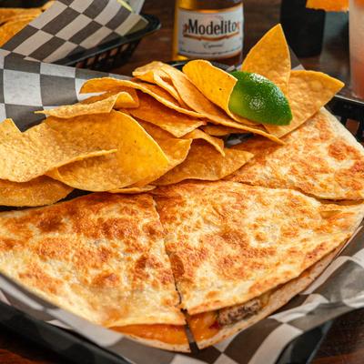 Quesadilla with tortilla chips.