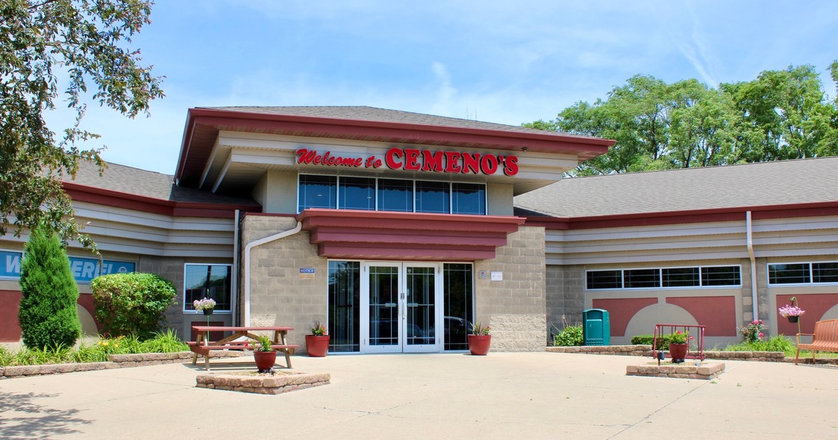 Exterior, storefront with entrance and signage