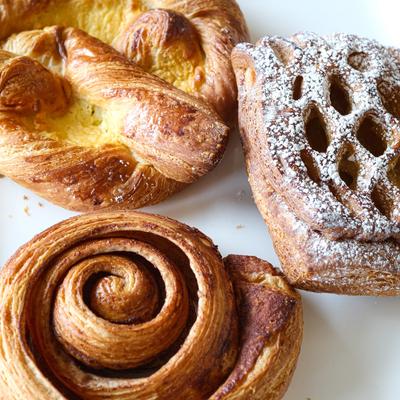 Apple croissant, Kouign-amann and cinnamon roll.