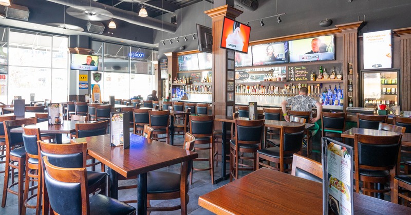 Interior, seating area with bar tables