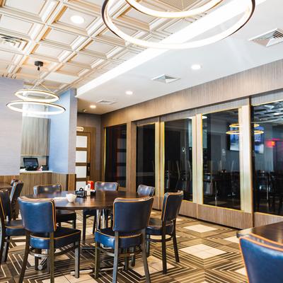 Interior, tables, chairs, decorative lighting, windows