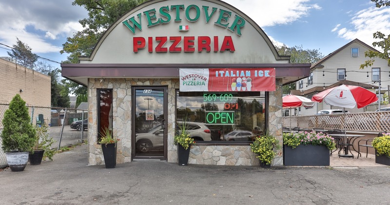 Exterior, restaurant front view, entrance, sign above