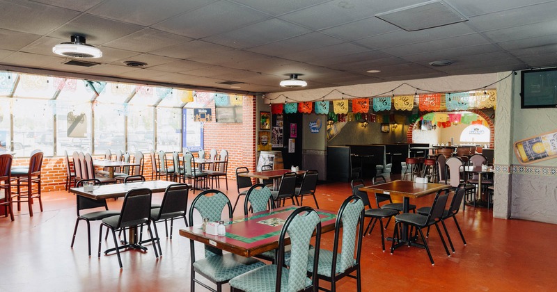 Interior, seating area with tables and chairs