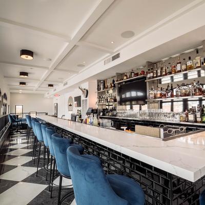 A long counter and chairs.