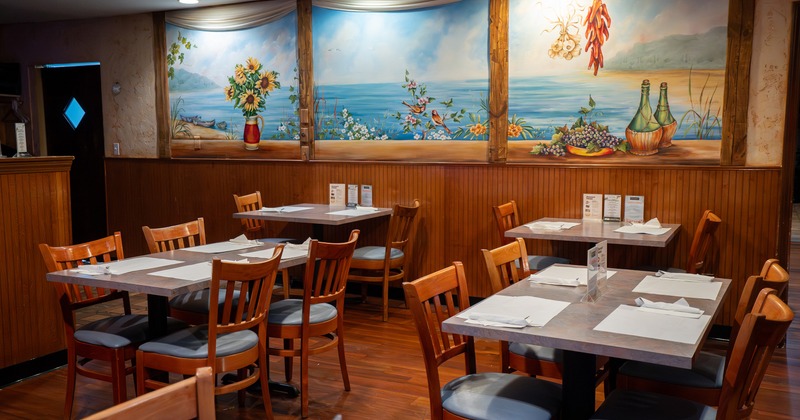 Interior dining area with tables ready for guests