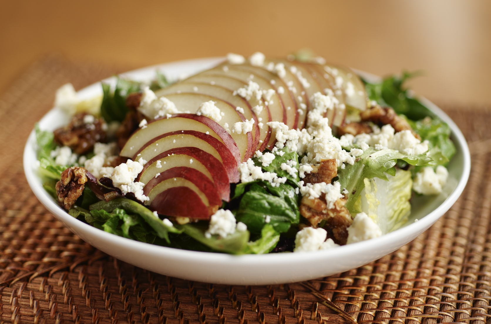Mixed greens, with apples, walnuts, cheese crumbles, and vinaigrette