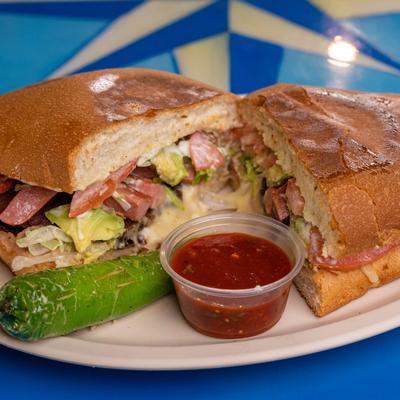 Cuban sandwich, with jalapeno and salsa dip.