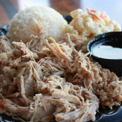Kalua Pork served with rice, mac salad and a dipping sauce.