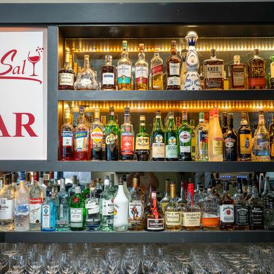 Back bar shelves with wines and spirits