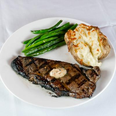 NY strip with asparagus and baked potato.