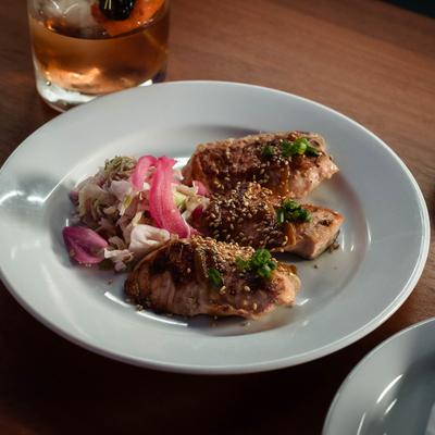 misoyaki glazed salmon with pickled slaw.