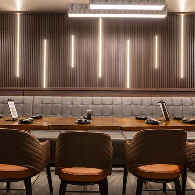 Interior, banquette, set dining tables and chairs.