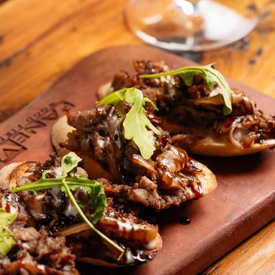 Shaved Ribeye Crostini.