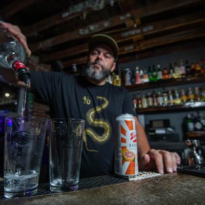 A person working at the bar.