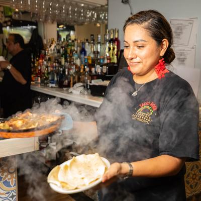 A person preparing food.