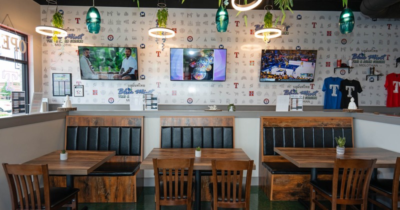 Interior, booths with tables and chairs