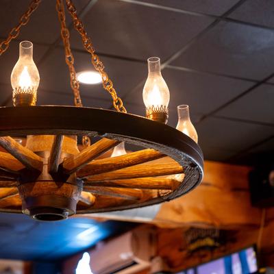 Interior, wheel chandelier lamp on the ceiling.