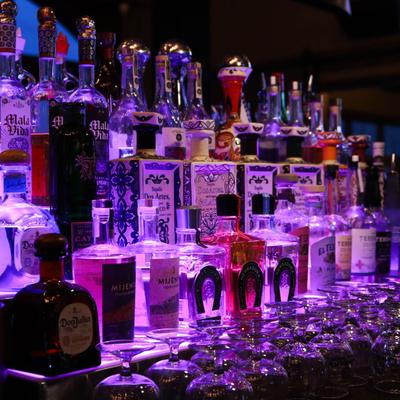 Bottles of spirits at a bar.