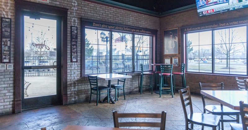 Interior seating area with tables near the exit door