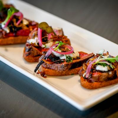Beef appetizers on a plate.