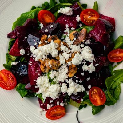 Farm House Salad of berries, greens, walnuts, tomato and cheese