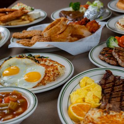 Different food dishes served on the table.