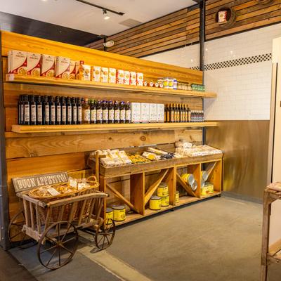 Interior, wooden shelves and a cart with various items